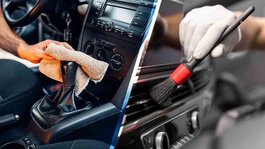 Vehicle interior being vacuumed and detailed