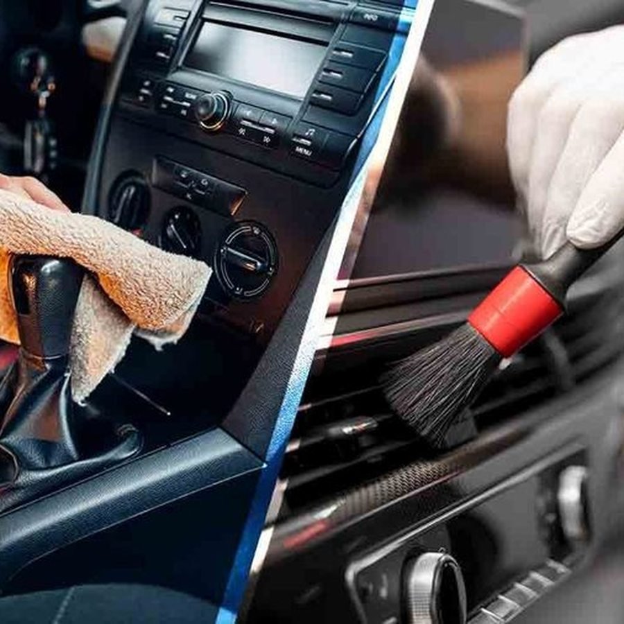 Vehicle interior being vacuumed and detailed