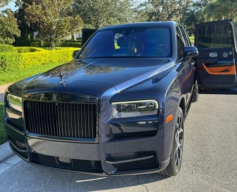 Dark Rolls-Royce Cullinan after a full auto detailing service