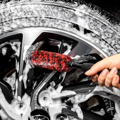 Wheel brush and wheel cleaner used on a foam covered wheel